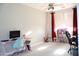Bright home office with dual workstations, natural light, and versatile space for work and creativity at 13686 N 151St Dr, Surprise, AZ 85379