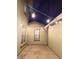 An enchanting patio illuminated by string lights creates a cozy outdoor space ideal for evening relaxation and gatherings at 13686 N 151St Dr, Surprise, AZ 85379