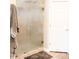 Bathroom featuring a glass-enclosed shower at 13686 N 151St Dr, Surprise, AZ 85379