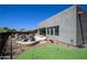 Expansive backyard featuring a swimming pool, putting green, desert landscaping and a patio area at 14045 E Geronimo Rd, Scottsdale, AZ 85259