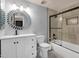 Updated bathroom featuring tile floors, modern vanity, and walk-in shower at 14215 N 36Th Way, Phoenix, AZ 85032