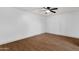 Bedroom with wood-look flooring and ceiling fan at 14215 N 36Th Way, Phoenix, AZ 85032