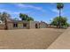 Charming single-story home featuring a well-kept exterior and desert-friendly landscaping at 14215 N 36Th Way, Phoenix, AZ 85032