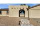 Up-close front exterior with custom desert landscaping and unique architectural design at 14215 N 36Th Way, Phoenix, AZ 85032