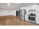 Open-concept kitchen featuring modern appliances and seamless flow to the living space at 14215 N 36Th Way, Phoenix, AZ 85032