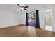 Spacious main bedroom featuring sliding glass door to the backyard at 14215 N 36Th Way, Phoenix, AZ 85032