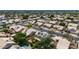 A high angle view of homes in a suburban neighborhood, many with solar panels on their roofs at 1631 N Avoca --, Mesa, AZ 85207