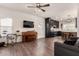 Open concept living room showcases the kitchen with a modern kitchen and dining area at 1631 N Avoca --, Mesa, AZ 85207