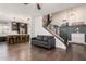 Open concept living room and kitchen space, creating a welcoming atmosphere for entertaining and daily living at 1631 N Avoca --, Mesa, AZ 85207
