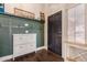 Mud room featuring storage, coat hooks, and a modern design providing functional decor at 1631 N Avoca --, Mesa, AZ 85207