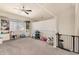 Spacious playroom with carpet, large window, ceiling fan, and room for play at 1631 N Avoca --, Mesa, AZ 85207