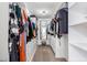 Organized walk-in closet with built-in shelving and drawers, providing ample storage and easy access at 1631 N Avoca --, Mesa, AZ 85207