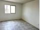 Bright bedroom with tile flooring and natural light at 2220 W Dora St # 220, Mesa, AZ 85201