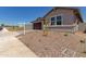 A single-Gathering home with desert landscaping and a two-car garage with a paver driveway at 25319 N 131St Dr, Peoria, AZ 85383