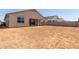 Spacious dirt backyard presents a blank canvas for creating your ideal outdoor oasis at 25324 N 131St Dr, Peoria, AZ 85383