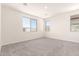 Spacious bedroom with new carpet and bright natural light at 25324 N 131St Dr, Peoria, AZ 85383