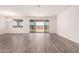 Bright living area with sliding glass doors, tile floors and natural light at 25324 N 131St Dr, Peoria, AZ 85383