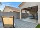 Backyard patio featuring a covered area with a ceiling fan and outdoor furniture at 2629 E Hidalgo Ave, Phoenix, AZ 85040