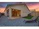 Private backyard with a patio, lounge chair, and storage shed at 2629 E Hidalgo Ave, Phoenix, AZ 85040