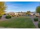 Manicured lawns and shrubs surround the homes in this well maintained community with mountain views at 2629 E Hidalgo Ave, Phoenix, AZ 85040