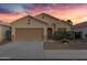 Inviting single Gathering home with a two car garage and desert landscaping at 2629 E Hidalgo Ave, Phoenix, AZ 85040