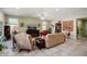 Bright living room features tile flooring and comfortable seating at 26456 W Cat Balue Dr, Buckeye, AZ 85396