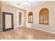 Bright bedroom with wood flooring, neutral paint, and natural light at 29703 N 70Th Ave, Peoria, AZ 85383
