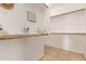 Large walk-in closet with organizers, shelves and clothing rods offers substantial storage space at 29703 N 70Th Ave, Peoria, AZ 85383