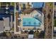 Aerial view showcases community pool with cabanas and lounge chairs, creating a resort-like atmosphere at 3661 E Appaloosa Dr, San Tan Valley, AZ 85140
