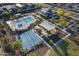 Aerial view of recreation center with a splash pad, pool, basketball court, and shaded playground at 3661 E Appaloosa Dr, San Tan Valley, AZ 85140