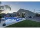 Relaxing backyard oasis with a sparkling pool, modern lounge chair, and comfortable outdoor seating area at 3661 E Appaloosa Dr, San Tan Valley, AZ 85140