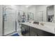 The bathroom features double sinks, wood cabinets, and walk-in shower at 3661 E Appaloosa Dr, San Tan Valley, AZ 85140