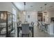 The dining area includes a chandelier, seating for six, and adjacent breakfast bar at 3661 E Appaloosa Dr, San Tan Valley, AZ 85140