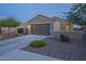 Inviting home exterior featuring a well-kept lawn, ample parking, and a welcoming facade at 3661 E Appaloosa Dr, San Tan Valley, AZ 85140