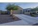 Charming single-Gathering home with a well-maintained yard and convenient two-car garage at 3661 E Appaloosa Dr, San Tan Valley, AZ 85140