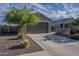 Charming home exterior with neutral paint, two-car garage and low-maintenance landscaping at 3661 E Appaloosa Dr, San Tan Valley, AZ 85140