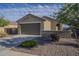 Single-story home with desert landscaping and a well-maintained front yard at 3661 E Appaloosa Dr, San Tan Valley, AZ 85140