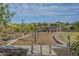 Community park featuring exercise equipment, seating areas, and landscaped grounds creating a welcoming environment at 3661 E Appaloosa Dr, San Tan Valley, AZ 85140