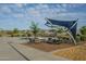 Community park boasts picnic tables under shade and landscaped surroundings for a relaxing outdoor experience at 3661 E Appaloosa Dr, San Tan Valley, AZ 85140