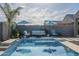 Inviting backyard pool featuring lounge area and ample patio space, perfect for outdoor entertaining on a sunny day at 3661 E Appaloosa Dr, San Tan Valley, AZ 85140