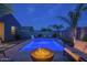 Backyard pool area with lush landscaping and cozy outdoor furniture for relaxing evenings at 3661 E Appaloosa Dr, San Tan Valley, AZ 85140