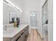Modern bathroom featuring a floating vanity with double sinks, sleek fixtures, and glass shower at 4220 N 32Nd St # 7, Phoenix, AZ 85018