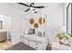 Stylish bedroom showcasing a unique bed frame, ceiling fan, and decorative wall art at 4220 N 32Nd St # 7, Phoenix, AZ 85018