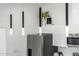 Chic dining area with stylish pendant lighting, and modern kitchen appliances at 4220 N 32Nd St # 7, Phoenix, AZ 85018