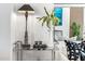 Stylish cart with decorative items, a modern lamp, and contemporary decor at 4220 N 32Nd St # 7, Phoenix, AZ 85018