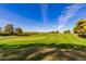 Lush green golf course with well-maintained grass and scenic views at 4303 E Cactus Rd # 202, Phoenix, AZ 85032