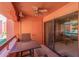 View of the private balcony featuring seating and sliding glass doors leading to the interior living space at 4303 E Cactus Rd # 202, Phoenix, AZ 85032