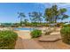 Relaxing pool area surrounded by lush greenery and lounge chairs at 4303 E Cactus Rd # 202, Phoenix, AZ 85032