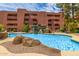Exterior of complex, displaying the pool and waterfall at 4303 E Cactus Rd # 202, Phoenix, AZ 85032