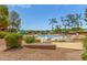 Relaxing pool area surrounded by lush greenery and lounge chairs at 4303 E Cactus Rd # 202, Phoenix, AZ 85032